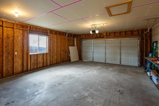 28 Bethany St, Columbia Falls, MT 59912 - garage featuring a garage door opener