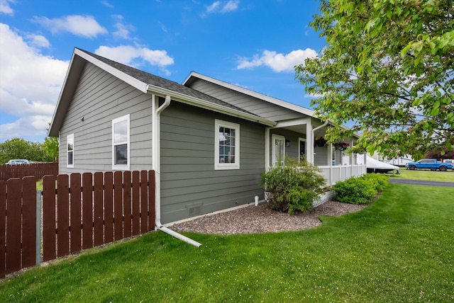 28 Bethany St, Columbia Falls, MT 59912 - view of home's exterior featuring crawl space and covered porch