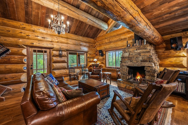131 Mccaffery Lookout Trl, Bigfork, MT 59911 - living area featuring hardwood / wood-style flooring, plenty of natural light, a chandelier, a stone fireplace, and wooden ceiling