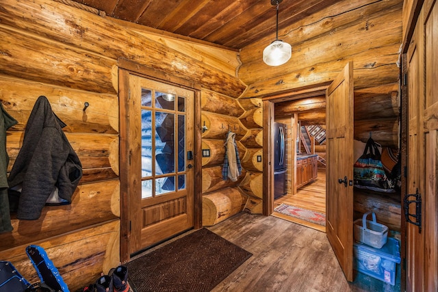 131 Mccaffery Lookout Trl, Bigfork, MT 59911 - foyer featuring wooden ceiling, wood finished floors, and log walls