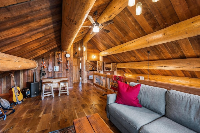 131 Mccaffery Lookout Trl, Bigfork, MT 59911 - living room featuring hardwood / wood-style floors, wooden ceiling, a ceiling fan, and wooden walls