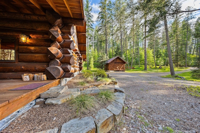 131 Mccaffery Lookout Trl, Bigfork, MT 59911 - view of side of property with log exterior