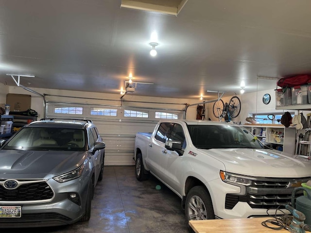 2669 Bunkhouse Pl, Missoula, MT 59808 - garage featuring a garage door opener