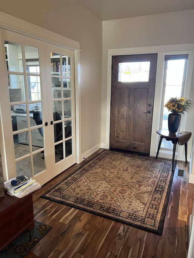 2669 Bunkhouse Pl, Missoula, MT 59808 - foyer featuring french doors, dark wood finished floors, and healthy amount of natural light