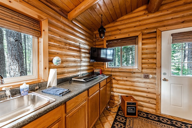 204 Cougar Meadow Dr, Saint Regis, MT 59866 - kitchen with a sink, wooden ceiling, dark countertops, and brown cabinets