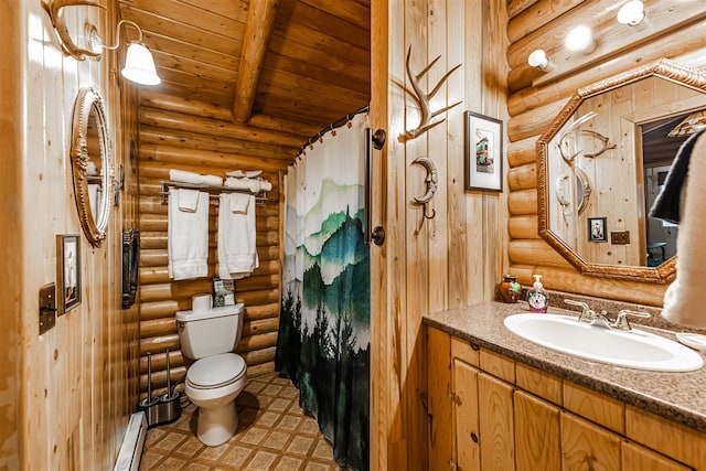 204 Cougar Meadow Dr, Saint Regis, MT 59866 - bathroom featuring log walls, toilet, baseboard heating, vanity, and wooden ceiling with exposed beams