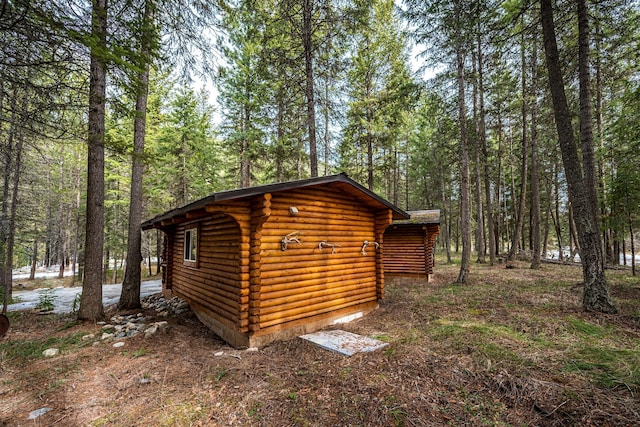 204 Cougar Meadow Dr, Saint Regis, MT 59866 - view of outbuilding featuring a forest view