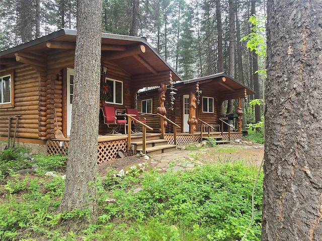 204 Cougar Meadow Dr, Saint Regis, MT 59866 - view of front of house with log siding