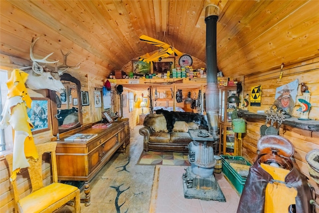 34 Outlaw Trl, Anaconda, MT 59711 - living area with lofted ceiling, wooden walls, wooden ceiling, and a wood stove
