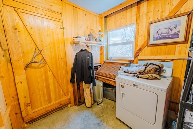 34 Outlaw Trl, Anaconda, MT 59711 - laundry room with washer / clothes dryer, wood walls, and radiator heating unit