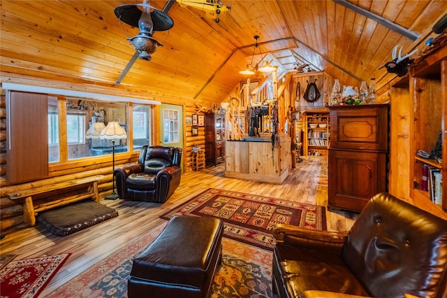 34 Outlaw Trl, Anaconda, MT 59711 - living area with wood ceiling, vaulted ceiling, hardwood / wood-style floors, and wood walls