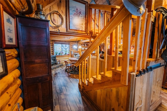 34 Outlaw Trl, Anaconda, MT 59711 - staircase featuring hardwood / wood-style flooring and rustic walls