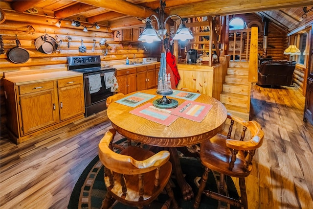 34 Outlaw Trl, Anaconda, MT 59711 - dining room featuring rustic walls, hardwood / wood-style flooring, and wooden ceiling