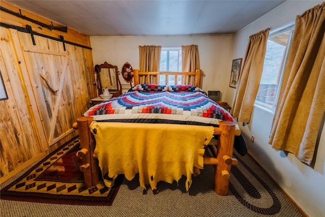 34 Outlaw Trl, Anaconda, MT 59711 - carpeted bedroom featuring wooden walls and baseboards