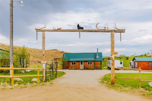 34 Outlaw Trl, Anaconda, MT 59711 - view of front of home with metal roof and a standing seam roof