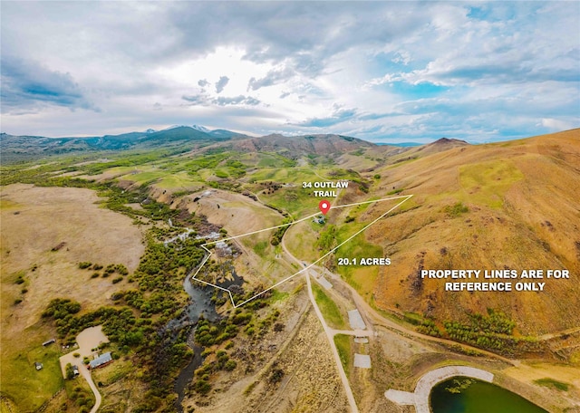 34 Outlaw Trl, Anaconda, MT 59711 - drone / aerial view of a mountain backdrop