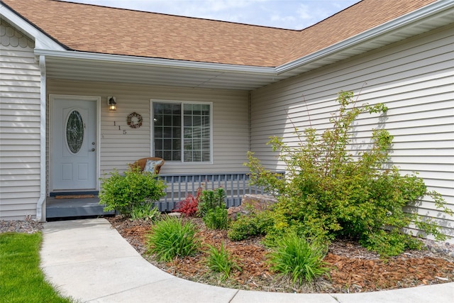 115 River Glen Ct, Kalispell, MT 59901 - entrance to property with covered porch and a shingled roof