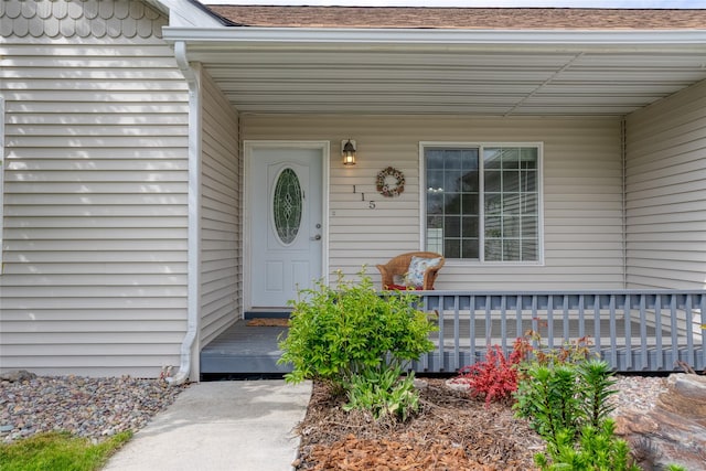 115 River Glen Ct, Kalispell, MT 59901 - view of exterior entry featuring covered porch