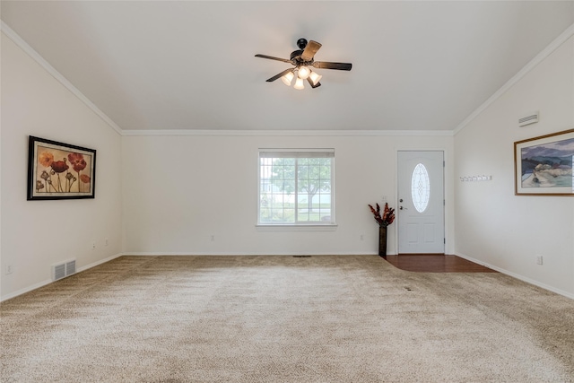 115 River Glen Ct, Kalispell, MT 59901 - foyer entrance featuring ornamental molding, vaulted ceiling, ceiling fan, carpet flooring, and baseboards