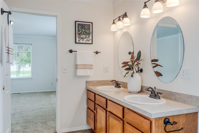115 River Glen Ct, Kalispell, MT 59901 - full bath with ornamental molding, double vanity, and baseboards