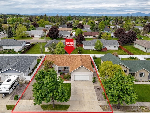 115 River Glen Ct, Kalispell, MT 59901 - aerial view of residential area with a mountainous background