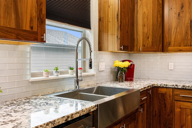 11515 Ninebark Way, Missoula, MT 59802 - kitchen with tasteful backsplash, a sink, and light stone countertops