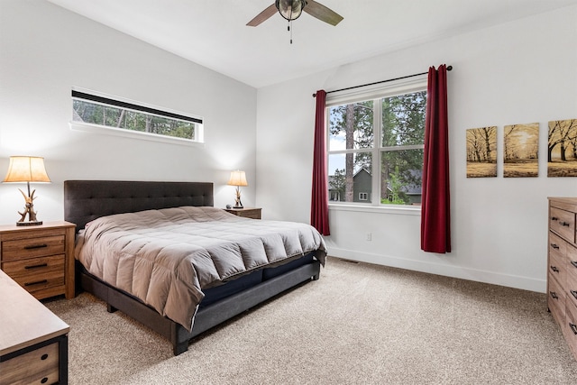 11515 Ninebark Way, Missoula, MT 59802 - bedroom with multiple windows, light colored carpet, baseboards, and a ceiling fan