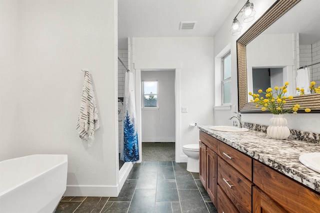 11515 Ninebark Way, Missoula, MT 59802 - full bath with a stall shower, double vanity, and baseboards