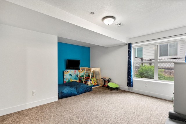 11515 Ninebark Way, Missoula, MT 59802 - unfurnished bedroom with carpet flooring, baseboards, and a textured ceiling