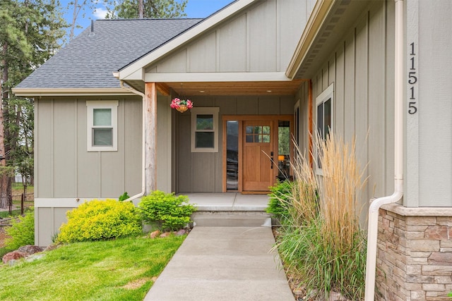 11515 Ninebark Way, Missoula, MT 59802 - doorway to property featuring roof with shingles and board and batten siding