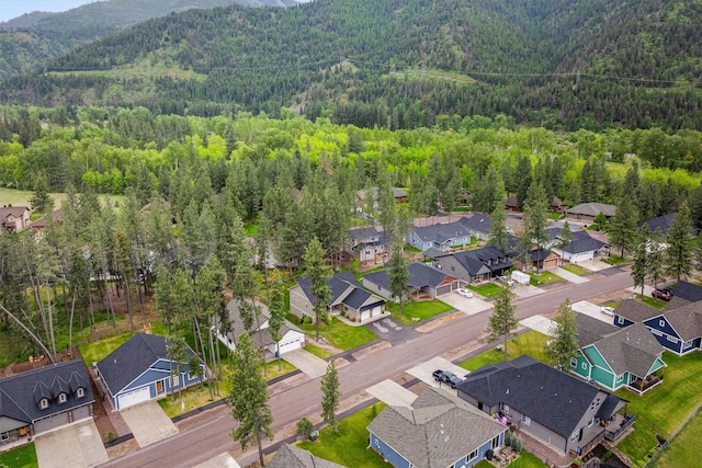 11515 Ninebark Way, Missoula, MT 59802 - aerial perspective of suburban area featuring a heavily wooded area and mountains