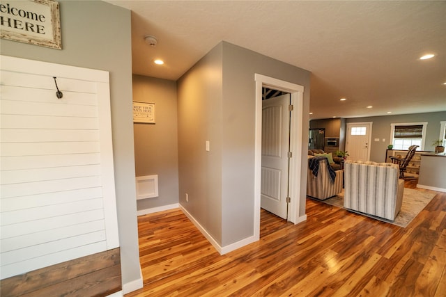 1610 Maple Dr, Fort Benton, MT 59442 - corridor with wood finished floors and recessed lighting
