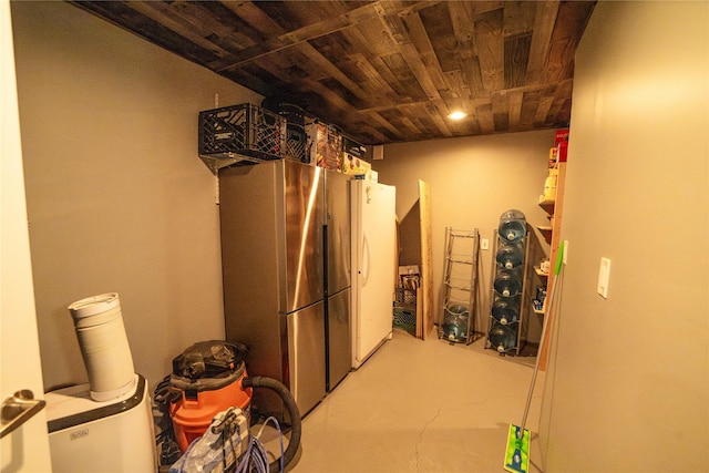 1610 Maple Dr, Fort Benton, MT 59442 - basement featuring freestanding refrigerator and wooden ceiling
