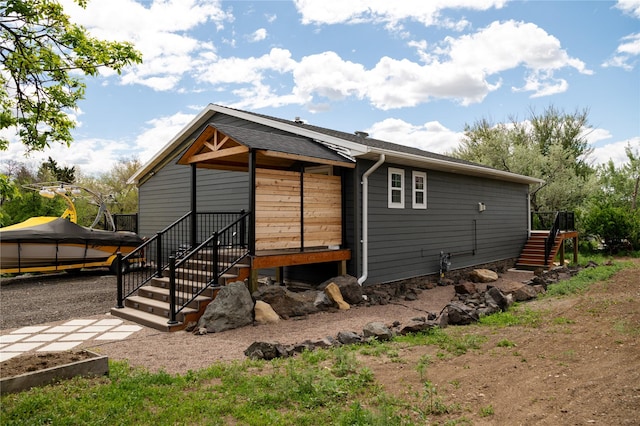 1610 Maple Dr, Fort Benton, MT 59442 - rear view of property featuring stairway and a deck