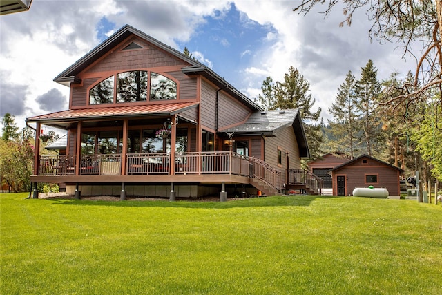 46274 Meadowlark Ln, Big Arm, MT 59910 - back of house with a yard and a wooden deck