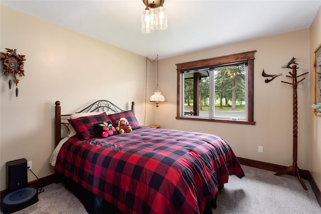 46274 Meadowlark Ln, Big Arm, MT 59910 - bedroom featuring carpet flooring and baseboards
