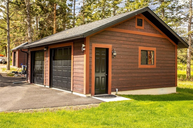 46274 Meadowlark Ln, Big Arm, MT 59910 - view of detached garage