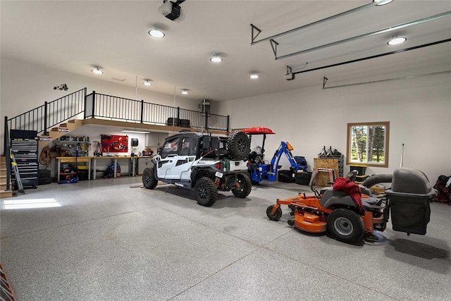 46274 Meadowlark Ln, Big Arm, MT 59910 - garage with recessed lighting and a garage door opener