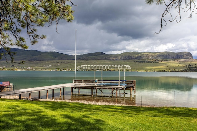 46274 Meadowlark Ln, Big Arm, MT 59910 - dock area featuring a water and mountain view