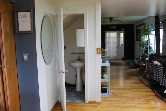 34575 Gunlock Rd, Charlo, MT 59824 - corridor featuring light wood-style floors and a sink