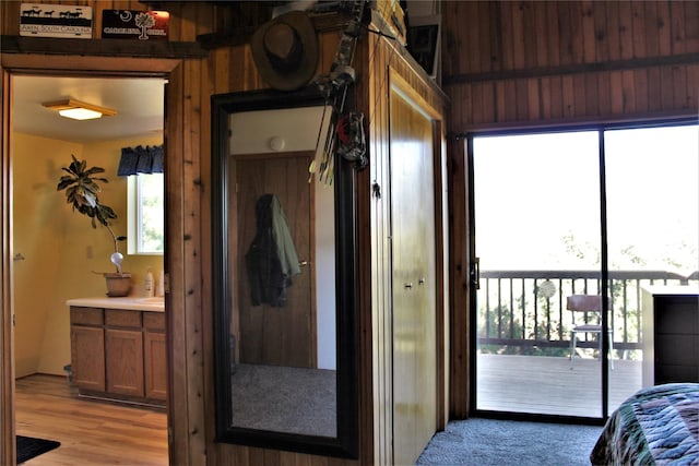 34575 Gunlock Rd, Charlo, MT 59824 - bedroom featuring access to exterior and multiple windows