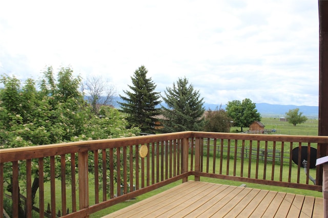 34575 Gunlock Rd, Charlo, MT 59824 - wooden deck with a yard and a mountain view