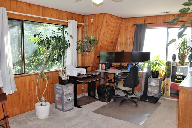 34575 Gunlock Rd, Charlo, MT 59824 - carpeted home office with wooden walls and ceiling fan