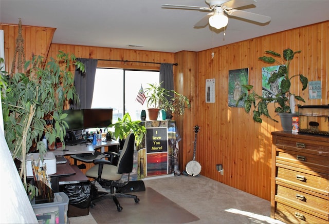 34575 Gunlock Rd, Charlo, MT 59824 - carpeted office space with wooden walls and a ceiling fan
