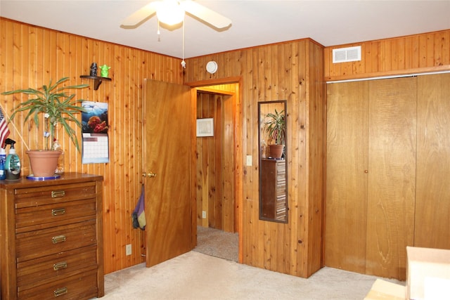 34575 Gunlock Rd, Charlo, MT 59824 - bedroom with carpet, wooden walls, and a closet