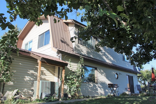 34575 Gunlock Rd, Charlo, MT 59824 - view of property exterior with metal roof