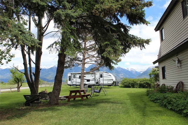 34575 Gunlock Rd, Charlo, MT 59824 - view of green lawn featuring a mountain view