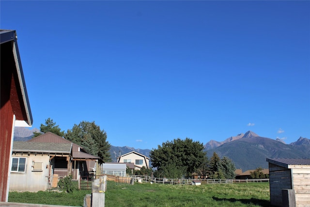 34575 Gunlock Rd, Charlo, MT 59824 - view of yard featuring a mountain view and an outbuilding