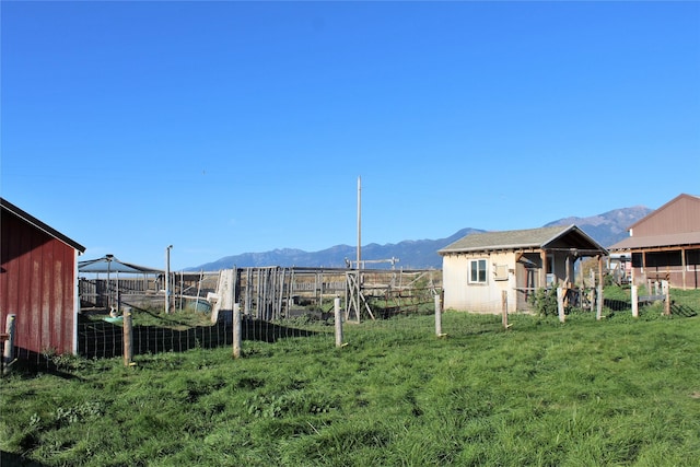 34575 Gunlock Rd, Charlo, MT 59824 - view of yard featuring a mountain view and an outdoor structure