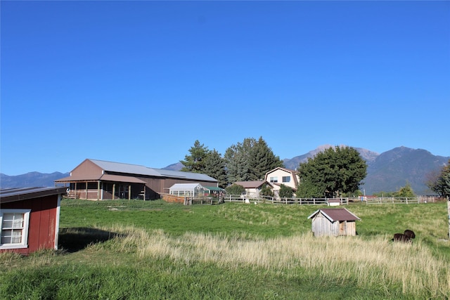34575 Gunlock Rd, Charlo, MT 59824 - view of yard featuring a mountain view and an outdoor structure